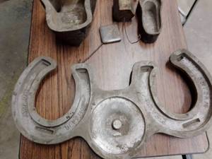 lot 1136 image: Vinyl Dispersion Molds (door stop, Football Stand, horseshoes) and MORE