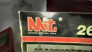 lot 1102 image: Dewalt grinder (2) tap and die set (1) socket set (1) torque wrench and more