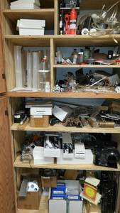 lot 1113 image: Contents of Cupboard Jacks, Gauges, Jorgensen Clamp, Weights, Pulleys and more.