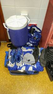 lot 1417 image: Sporting Lot, uniforms, cooler, NEW Slider Pads (3), pedometers, and more.