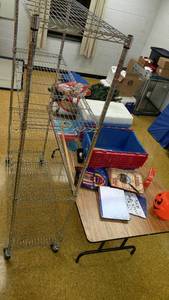 lot 1438 image: Folding Table with Contents and Rolling Metal Rack