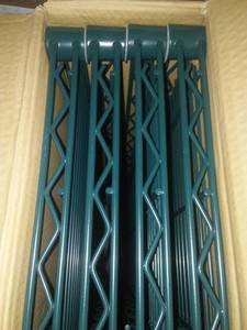 lot 1293 image: Shelving Lighting, 3-ring bonders, drop in ceiling grid and more. Some New in Box.