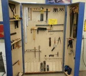 lot 827 image: Blue Storage Cabinet with contents. Stanley Planer, hammers, Hand Saw Variety, Clamps and more 74 x 34 11