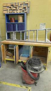 lot 830 image: Shop Vac w Accessories, 6 ft. Aluminum Ladder, Storage Cabinet and more.