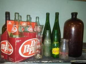 lot 1346 image: Vintage Bottles, Dr. Pepper, Milk, Coca Cola, apothecary, Squirt and more.