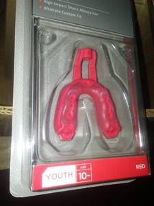 lot 843 image: Mouth Guard  Shock Doctor Gel Max (27) Red includes facemask strap 10 and under.