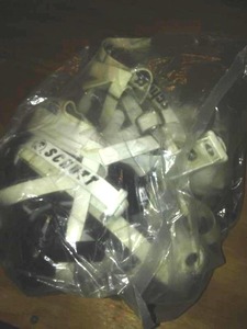 lot 845 image: Schutt Chin Straps Bag  football.