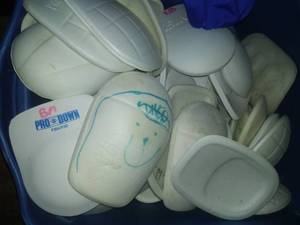 lot 850 image: 7 Totes  Pads, padded pants, girdles etc.