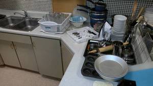 lot 1176 image: Misc. Kitchen Plates, Utensils, Cookware and more.  See Pictures for Details.