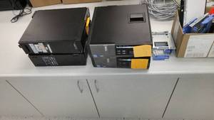 lot 943 image: Computer parts. Various Chargers keyboards wiring Towers. Non-working.