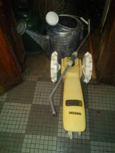 lot 870 image: Nelson sprinkler tractor galvanized can and more. You get the whole closet