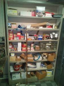 lot 1122 image: Shelving unit with contents 85 x 53 x 10in