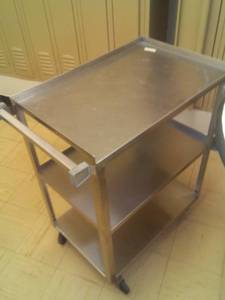 lot 1561 image: Table, Chairs (3) and rolling cart.
