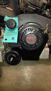 lot 1203 image: NEW Tecumseh XLPRO 5 2 Stroke Motor.