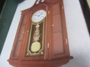 lot 42 image: Cherry Curio Wall Clock