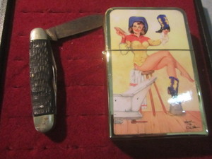 lot 59 image: Mega Light, Pocket Knife