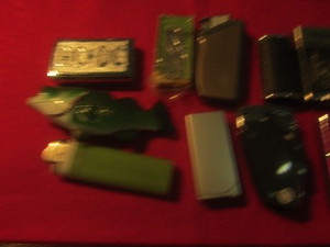 lot 66 image: Lighters - AC-DC, Fish