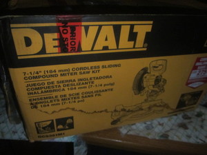 lot 102 image: DeWalt Cordless Sliding Compound Miter Saw Kit