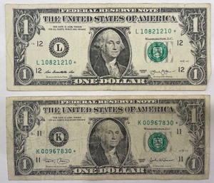 Two $1 Star Notes - K00967830, L10821210