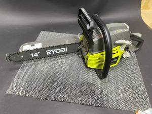 lot 29 image: RYOBI 14 in. 37cc 2-Cycle Gas Chainsaw