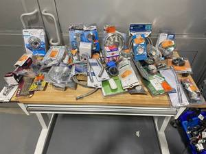 lot 34 image: Lot #1 Huge lot of bathroom supplies, shower, tub and faucet handles, drain covers, shower heads, and MORE