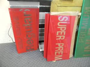 lot 48 image: RED & GREEN PLASTIC GAS STATION DISPLAY SIGNS - SEE PICTURES