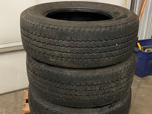 lot 10 image: Set Of (4) Continental LT265  75  R19 Truck Tires