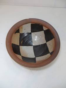 lot 19 image: Large Signed Ceramic Bowl wCheckerboard Pattern