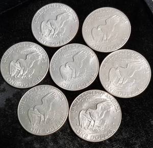 GROUP OF 7 EISENHOWER DOLLARS