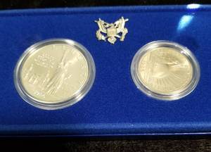 1986 US ELLIS ISLAND COMMEMORATIVE SILVER DOLLAR & CLAD HALF 2 COIN SET