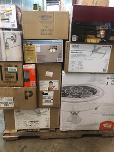 Pallet with assorted indooroutddor lighting and ceiling fans many never used some maybe missing parts