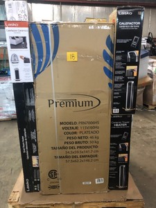 Pallet of assorted of appliances, includes refrigerator and assorted Heaters