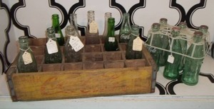 lot 19 image: Vintage Soda Bottles and Crate