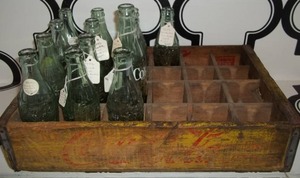 lot 34 image: Vintage Soda Bottles and Crate