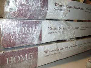 lot 221 image: 3 Cases of Home Decorators 12MM Copper Wood Fusion Flooring 14