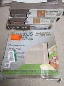 lot 225 image: 4 Cases of Vinyl Flooring (2) Traffic Master -Brown Wood Parquet), (1) - Chaucer, (1) - Nexus Tile Collection (Pattern #FTVWD23020) All 12 X 12 14