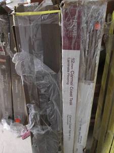 lot 230 image: 2 Cases of Traffic Master Laminate Flooring (Reclaimed Oak), 2 Cases of Home Decorators 12MM Flooring (Coast Teak) Some Damage, See Photos End of 5C