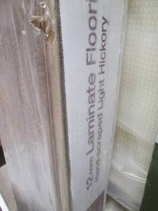 lot 244 image: Home Decorators 12MM Laminate Floor...