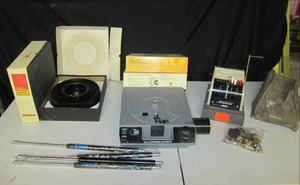 lot 8 image: Vintage Kodak Projector, Slide Trays, Speedrite Check Imprinter, Air Shocks