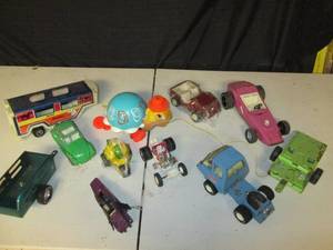 lot 16 image: Tonka Truck, Jeep, Roadster, and Trike, Nylint Roadster W3 Trailers, Metal VW, Kenner and Old Fisher Price Pull Toy- Turtle 4C...