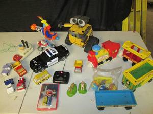 lot 17 image: Vintage Tonka Truck, Buddy L, Robot Wall E RC (Remote in Lot #18), Rescue Rangers Chopper & Figurines, Vintage Transformers Light Switch Plate, More     ...