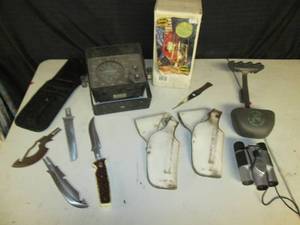 lot 23 image: Lowrance Depth Finder, Western Switch Interchangeable Hunting Knife, Lantern, Holsters, Arrow Holder, Vivitar Binoculars Untested