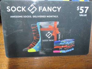 lot 82 image: Sock Fancy Gift Card ($57.00 Value)