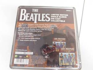 lot 54 image: The Beatles Single Sleeve Die Cast Collectible