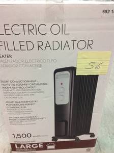 lot 56 image: 1,500-Watt Oil-Filled Radiant Electric Space Heater with Thermostat in good condition