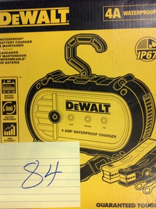 lot 84 image: DEWALT 4 Amp Professional Waterproof Battery Charger in good condition