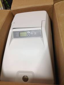lot 128 image: GE 30,000 Grain Water Softener NOT USED whit damage on the plastic cover and base please review the pictures