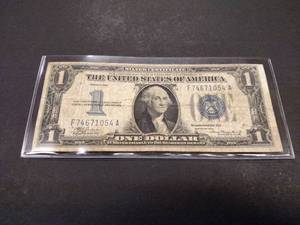 1934 Funny Back One Dollar Silver C...