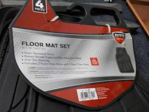 lot 1 image: Auto Drive 4 piece floor mat set...