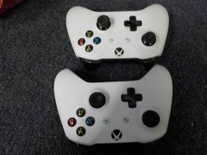lot 11 image: 2 gaming controls...